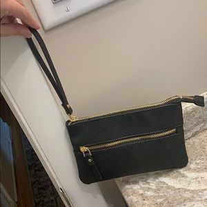 Black purse with gold zipper